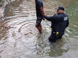 Homem se joga em córrego para tentar fugir da prisão em Cuiabá